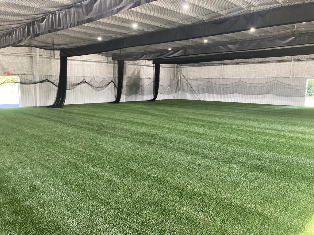 Installing indoor soccer field turf